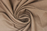 Swirled swatch light brown flannel fabric
