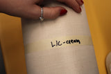 Roll of slubbed linen in cream
