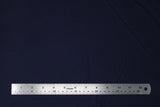 Flat swatch of cotton solid in indigo blue