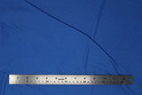 Flat swatch of cotton solid in sapphire (bright blue)