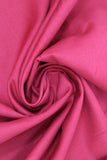 Swirled swatch of cotton solid in scarlet (dark red)