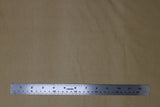 Flat swatch of cotton solid in tan