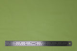 Flat swatch of cotton solid in lime