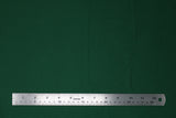 Flat swatch of cotton solid in emerald