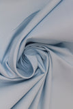 Swirled swatch of cotton solid in sky blue