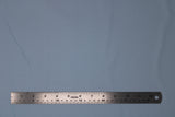 Flat swatch of cotton solid in sky blue