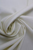 Swirled swatch of cotton solid in off white
