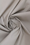 Swirled swatch of cotton solid in beige