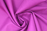 Swirled swatch of cotton solid in mauve