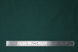 Flat swatch of cotton solid in faded green