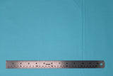 Flat swatch of cotton solid in cornflower blue (bright light blue)
