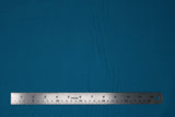 Flat swatch of cotton solid in green turquoise