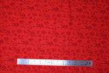 Flat swatch of sea life fabric in red aquatic plants (bright cherry red fabric with tossed dark red sea plants outlines and white bubbles)