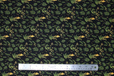 Flat swatch of sea life fabric in green aquatic plants (black fabric with tossed green and yellow sea greenery/plants and bubbles)