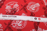 Raw hem swatch of assorted Canadian custom motorcycles fabric in red (red fabric with tossed logo and text related to Canadian custom motorcycles "Custom" text, etc. in white, black)