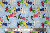 Flat swatch mae flowers scene (girls with umbrellas) printed fabric in blue