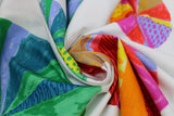 Swirled swatch printed fabric in Rainbow Patterned Circles