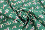 Swirled swatch Oh Holy Night themed Christmas fabric in Mangers on Green