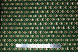 Flat swatch Oh Holy Night themed Christmas fabric in Mangers on Green