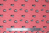 Flat swatch pink bamboo fabric (pale baby pink fabric with pink bamboo chutes allover and scattered cartoon pandas in various sizes/poses)