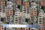 Flat swatch stacked houses fabric (lines of stacked residential style houses with american flags and labels "General Store" "Town Hall" etc. with road and greenery in background)
