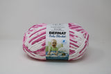 Ball of Bernat Baby Blanket in shade Pink Dreams (hot pink, soft pink, white)