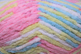 Pitter Patter (yellow, pink, blue, white) swatch of Bernat Baby Blanket