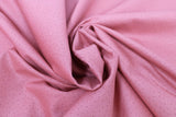 Swirled swatch fabric in Dots on Light Pink