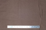 Flat swatch small print fabric in brown