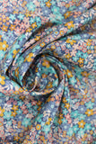 Swirled swatch flower & plant print fabric in forget me not (multicoloured flowers)