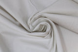 Swirled swatch tiny florals fabric in blossom (white on neutral)