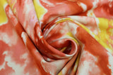 Swirled swatch Swirls & Clouds printed fabric in the lightkeepers quilt (yellow/orange clouds)