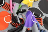 Swirled swatch cartoon female side profile printed fabric