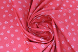 Swirled swatch tiny florals fabric in park (small flowers on red)