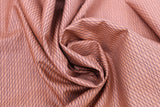 Swirled swatch fabric in dreaming of snow (burnt orange)