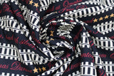 Swirled swatch text print fabric in railroad stripe