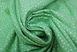 Swirled swatch circles & dots print fabric in Today is a good day for a good day! (dots on green)