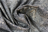 Swirled swatch circles & dots print fabric in shimmer (on black)