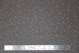 Flat swatch tiny florals fabric in flower specks (white on grey)
