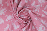 Swirled swatch flower & plant print fabric in Janey (white on pink)