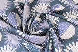Swirled swatch sunflower fabric (dark pale blue fabric with tossed and layered white and blue sunflowers with half striped half polka dotted centers)