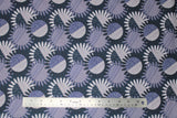Flat swatch sunflower fabric (dark pale blue fabric with tossed and layered white and blue sunflowers with half striped half polka dotted centers)