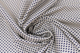 Swirled swatch chain fabric (white fabric with small black diamonds arranged to look like chain pattern)