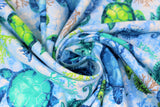 Swirled swatch sealife fabric (white and blue water look marbled fabric with green, blue and teal turtles and seahorses with colourful coral)