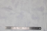 Flat swatch near solid print fabric in white