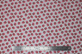 Flat swatch jam fabric (white fabric with tossed cartoon red jam jars with pink cover with red bow, some have a small "jam" label on front and some have a strawberry)