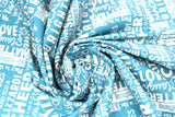 Swirled swatch winter printed fabric in Text on Blue (winter words)
