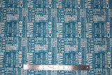 Flat swatch winter printed fabric in Text on Blue (winter words)