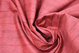 Swirled swatch winter printed fabric in Orange Barnboard
