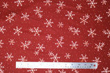 Flat swatch winter printed fabric in White Snowflakes on Orange
